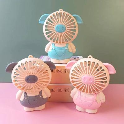 Quạt sạc Heo để bàn có dây đeo, có đèn phát sáng